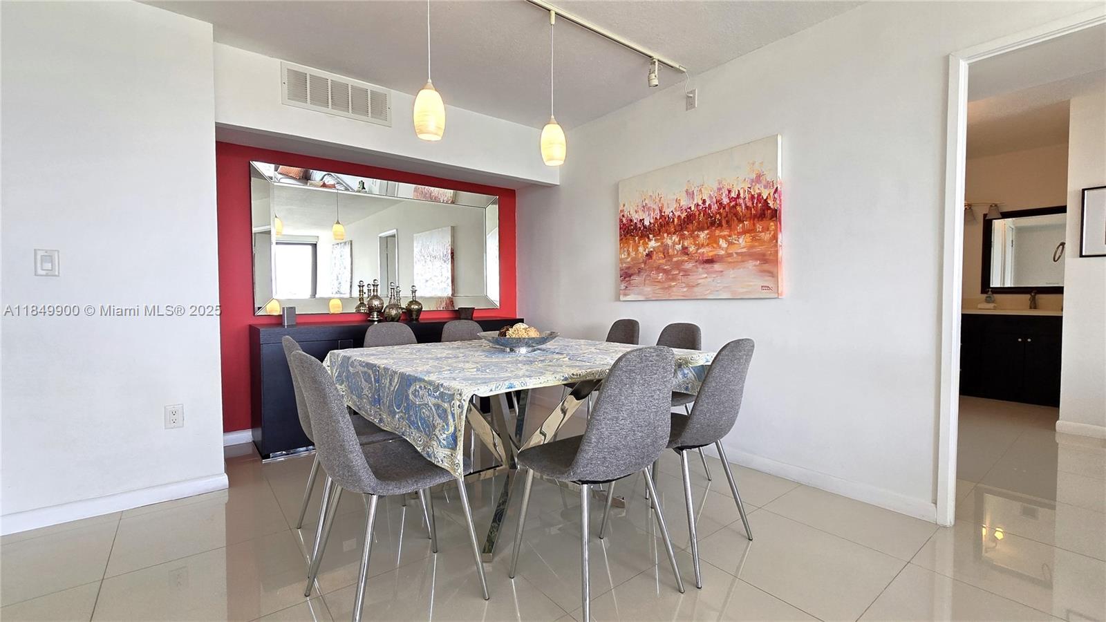 3731 North Country Club Drive, Unit 1825 Aventura, FL 33180 - Photo 4 of 25 a dining room with furniture and window