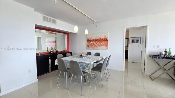 a view of a dining room with furniture