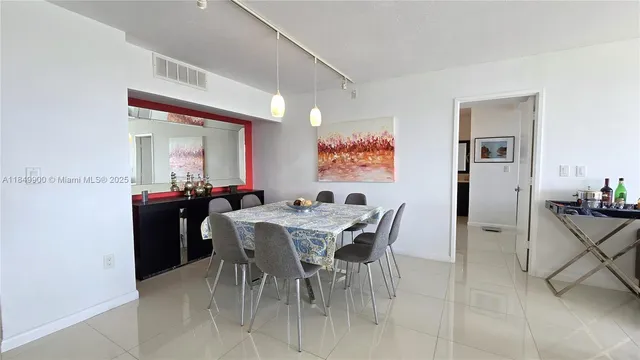 a view of a dining room with furniture