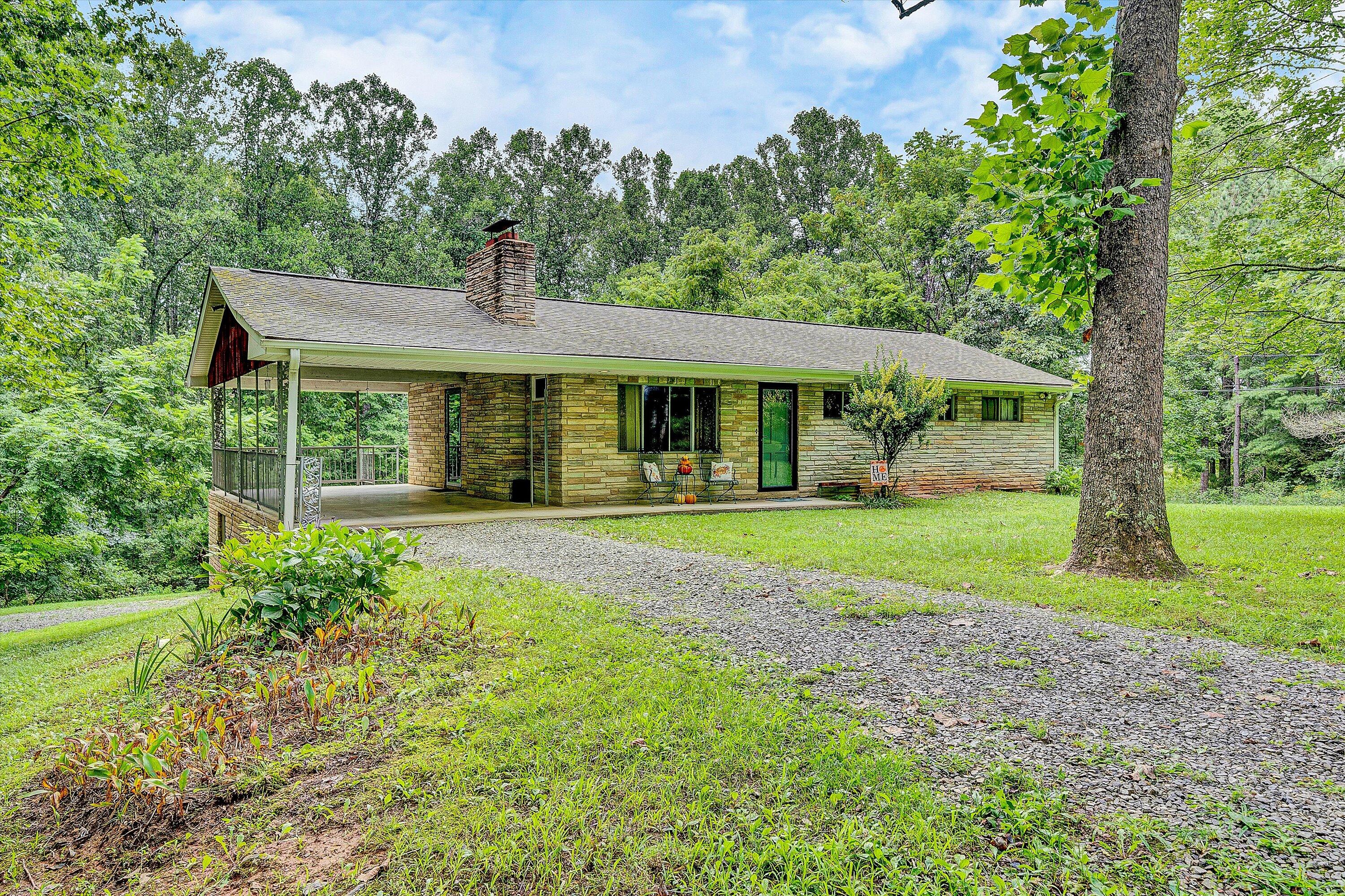 4463 Nemmo Road Vinton, VA 24179 - Photo 2 of 34 a front view of a house with garden
