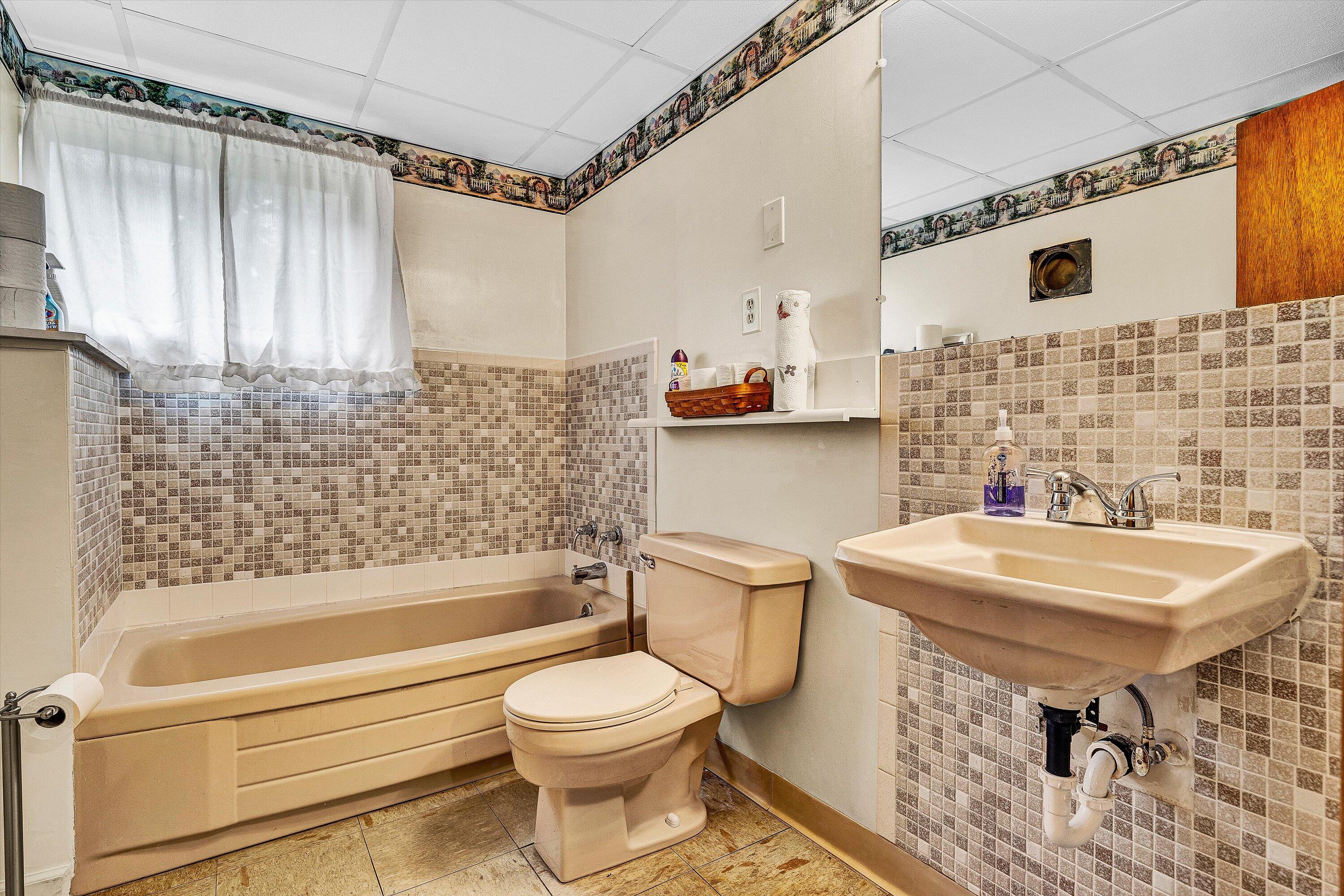 4463 Nemmo Road Vinton, VA 24179 - Photo 20 of 34 a bathroom with a sink toilet and shower