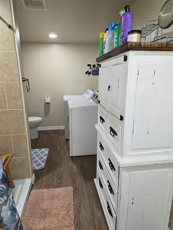 242 Treasure Beach Comanche, TX 76442 - Photo 12 of 22 a bathroom with a sink and a toilet