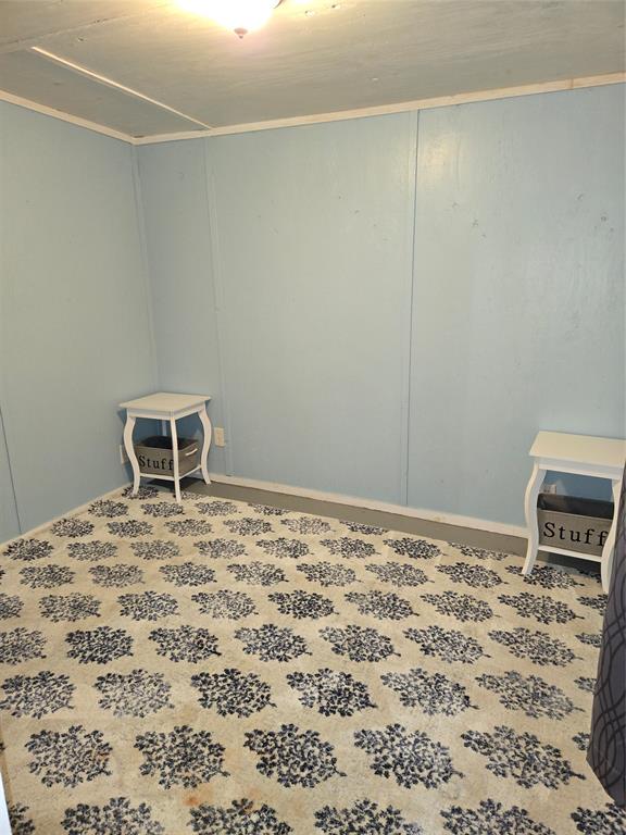 242 Treasure Beach Comanche, TX 76442 - Photo 9 of 22 a room with a bed