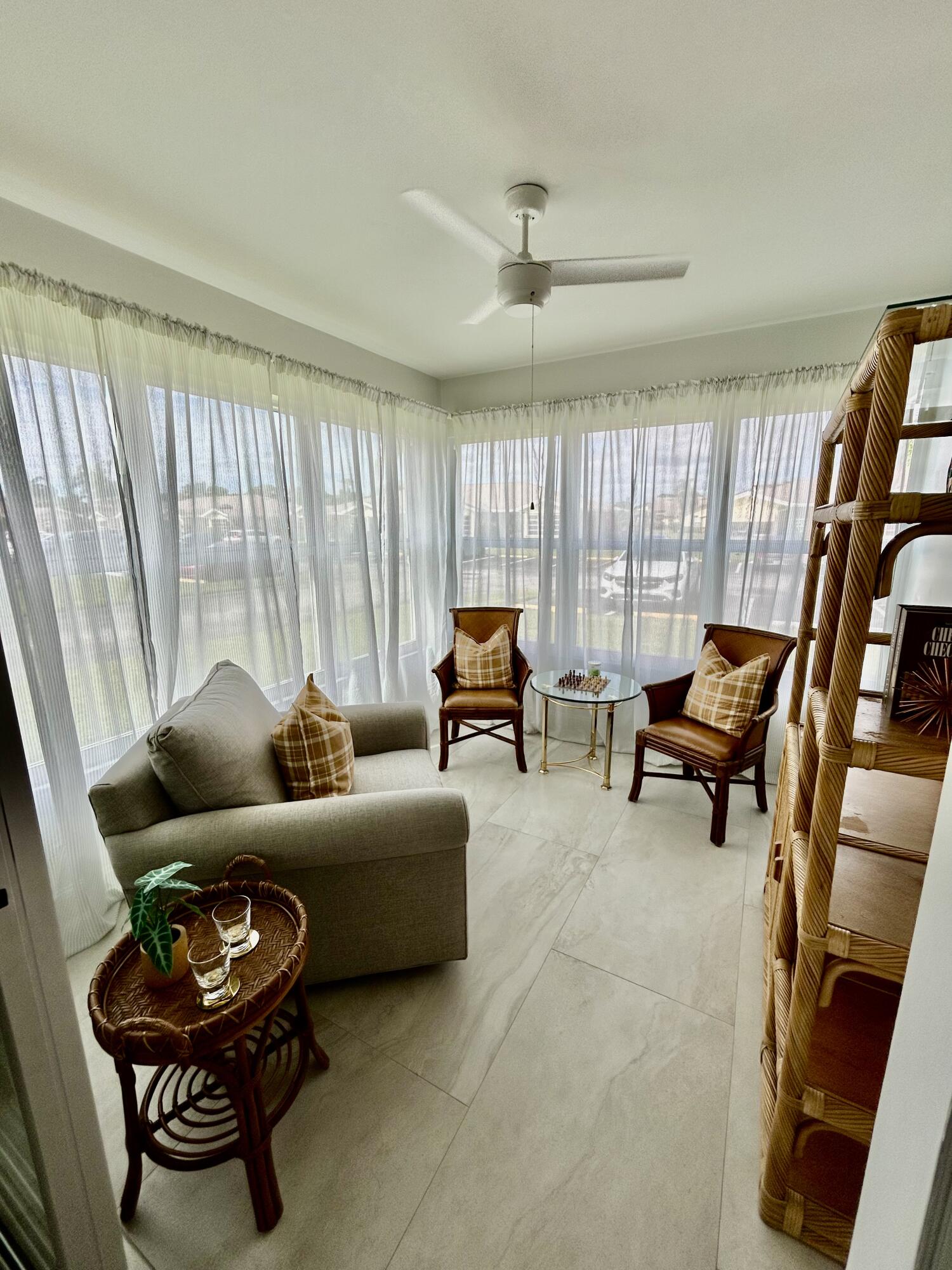 5289 Lake Front Boulevard, Unit D Delray Beach, FL 33484 - Photo 4 of 14 a living room with furniture and a window