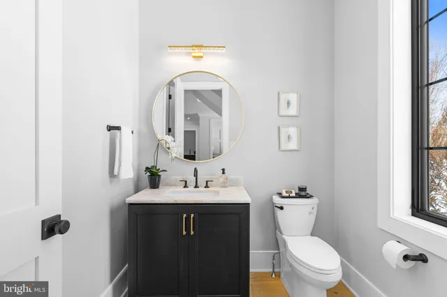 a view of a living room with a fireplace and painted walls