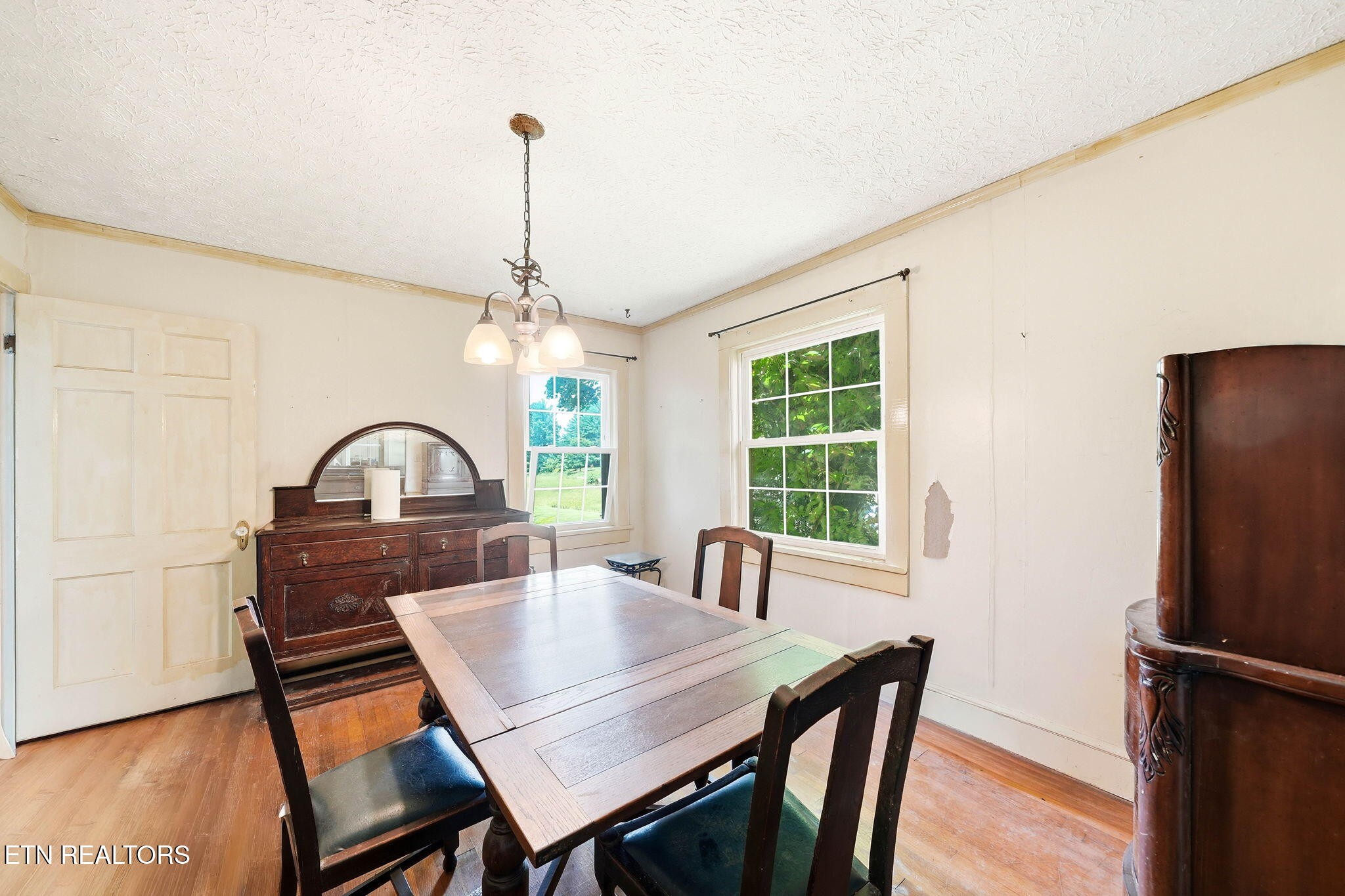 3992 Highway 92 Rutledge, TN 37861 - Photo 12 of 34 a view of a dining room with furniture window and wooden floor