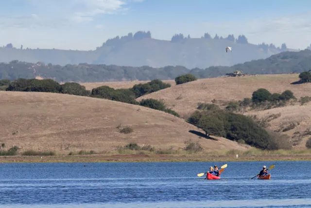 a view of a lake with a mountain in the background