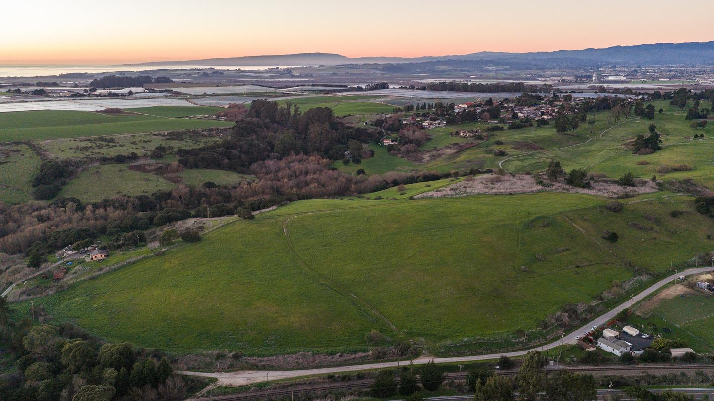 967 Salinas Road Watsonville, CA 95076 - Photo 4 of 23 an aerial view of a house with a yard
