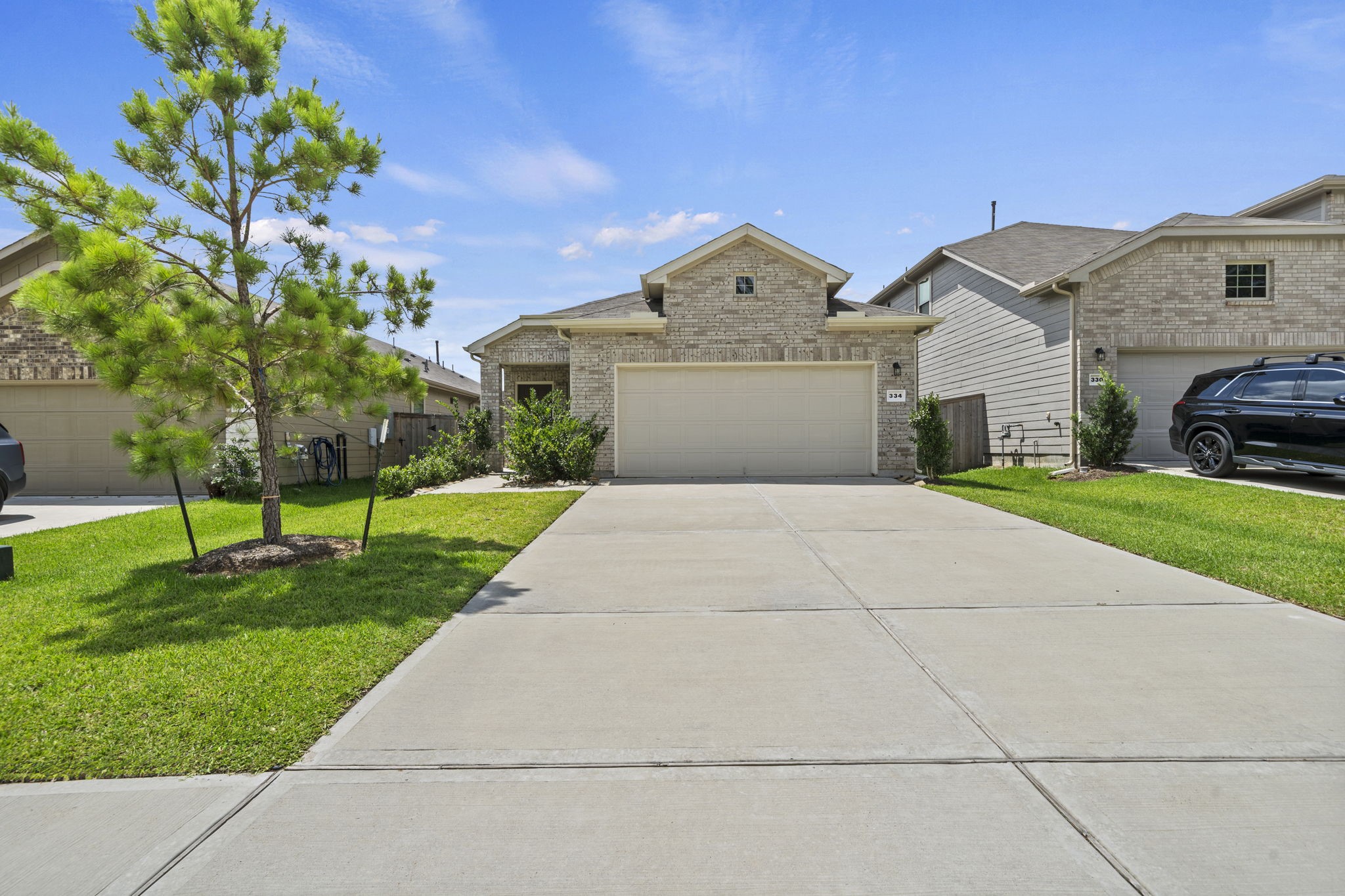 334 Maple Bark Trail Willis, TX 77378 - Photo 24 of 26 View of the driveway.