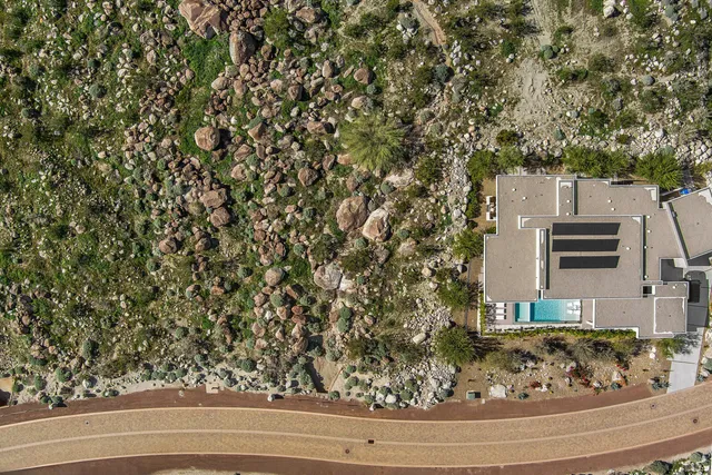 a view of a city with mountains in the background