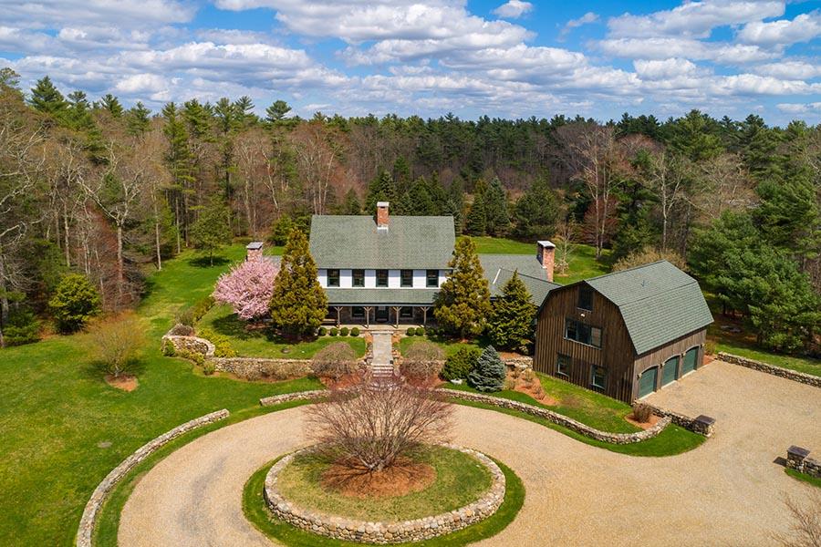 30 Vaughan Hill Road Rochester, MA 02770 - Photo 2 of 22 an aerial view of a house with garden statue and a fire pit
