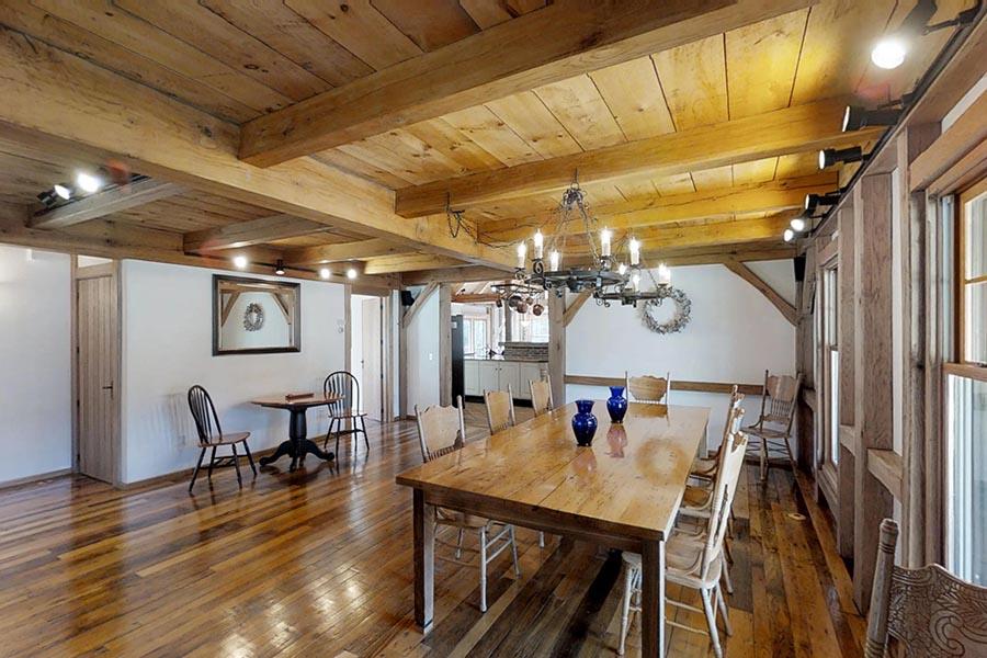 30 Vaughan Hill Road Rochester, MA 02770 - Photo 6 of 22 a view of a dining room with furniture wooden floor and chandelier