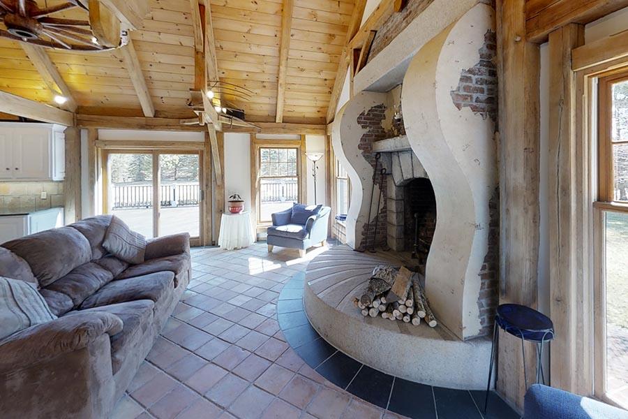 30 Vaughan Hill Road Rochester, MA 02770 - Photo 8 of 22 a living room with furniture a window and a chandelier