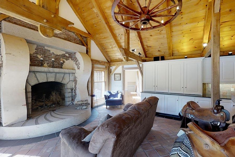 30 Vaughan Hill Road Rochester, MA 02770 - Photo 9 of 22 a living room with furniture and a fireplace