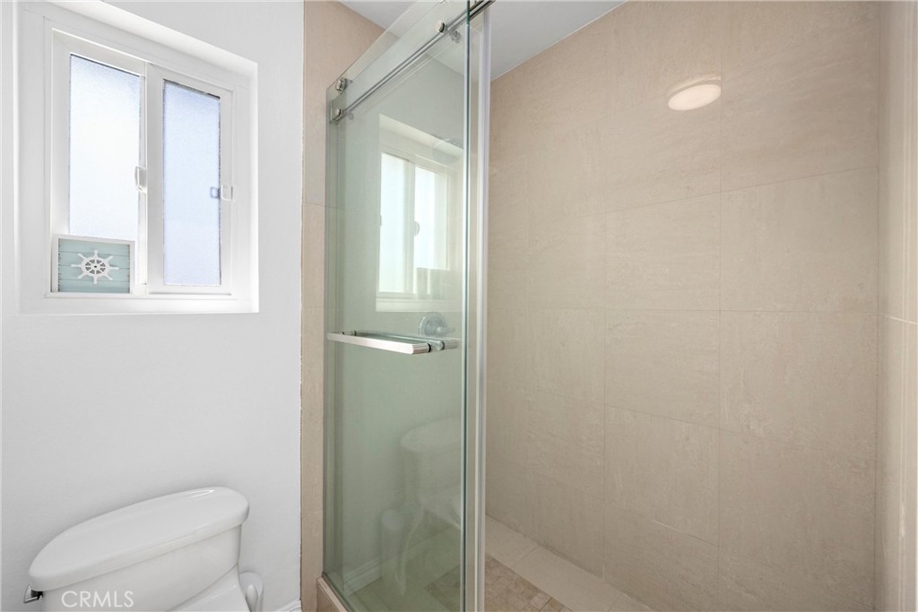 1415 Rolling Knoll Road Diamond Bar, CA 91765 - Photo 12 of 24 a bathroom with a toilet and a shower