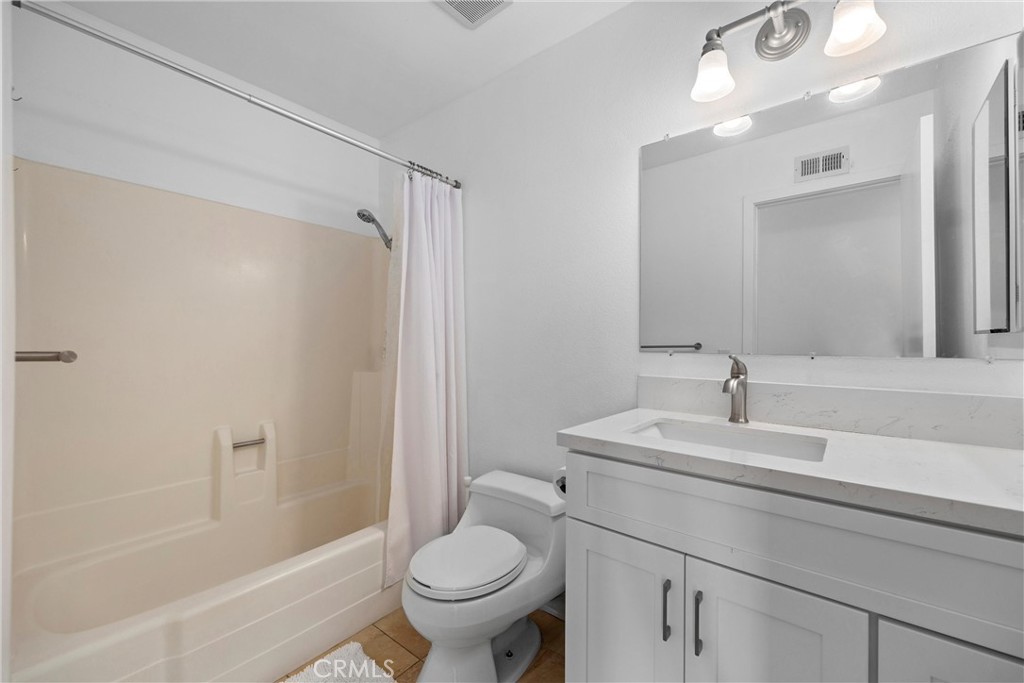1415 Rolling Knoll Road Diamond Bar, CA 91765 - Photo 16 of 24 a bathroom with a sink toilet and shower