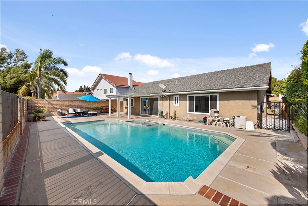 1415 Rolling Knoll Road Diamond Bar, CA 91765 - Photo 17 of 24 a view of a house with swimming pool and sitting area
