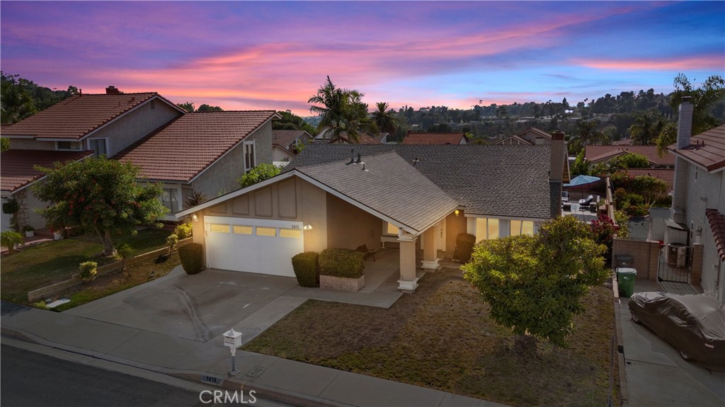 1415 Rolling Knoll Road Diamond Bar, CA 91765 - Photo 3 of 24 a view of a house with a yard