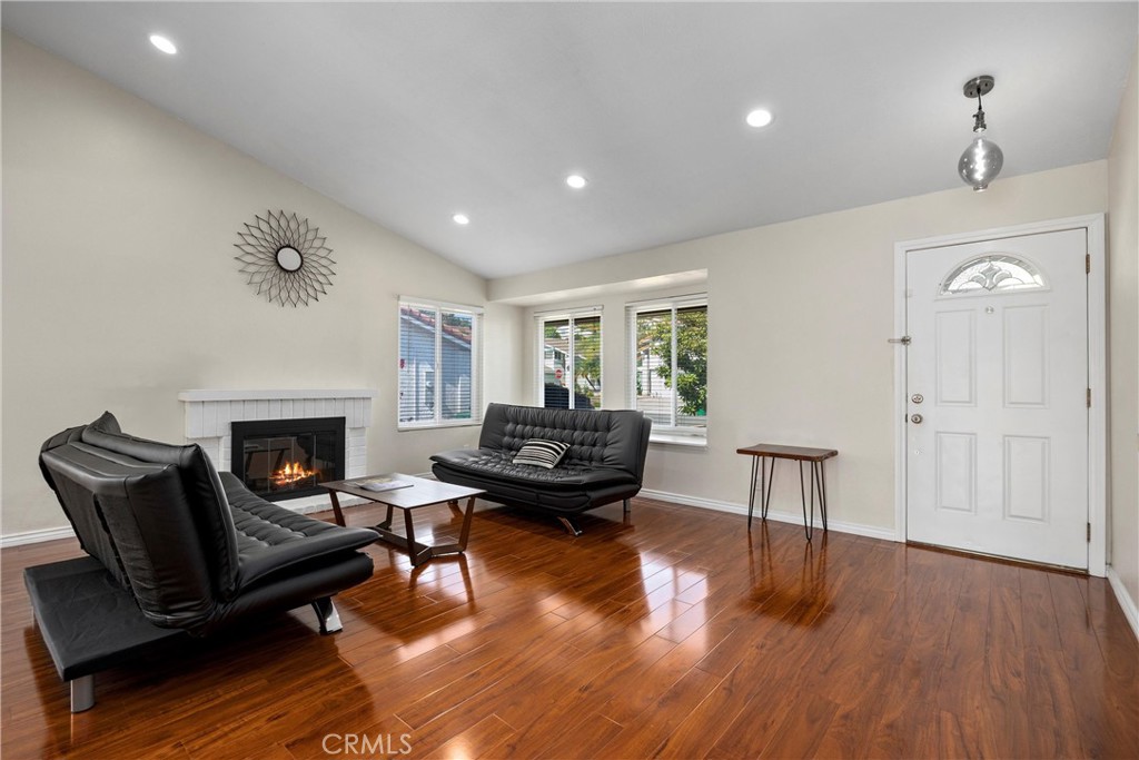 1415 Rolling Knoll Road Diamond Bar, CA 91765 - Photo 4 of 24 a living room with furniture and a fireplace