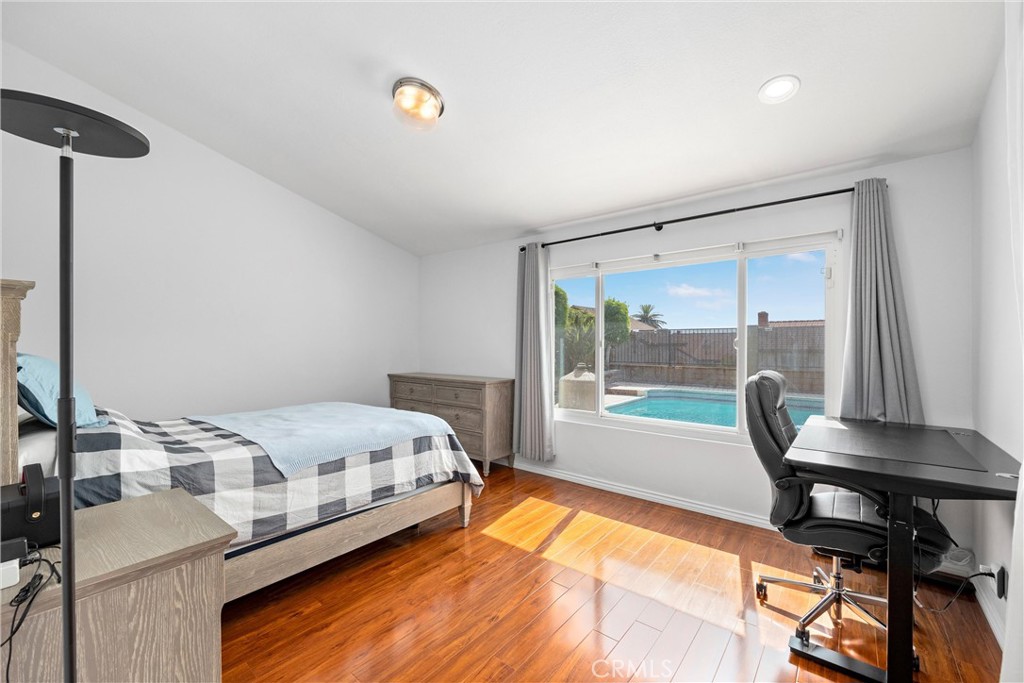 1415 Rolling Knoll Road Diamond Bar, CA 91765 - Photo 10 of 24 a bedroom with a bed and a table