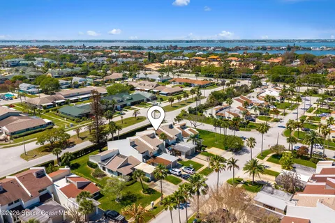 an aerial view of residential building with parking space
