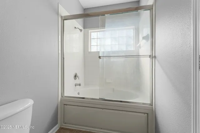 a bathroom with a bathtub