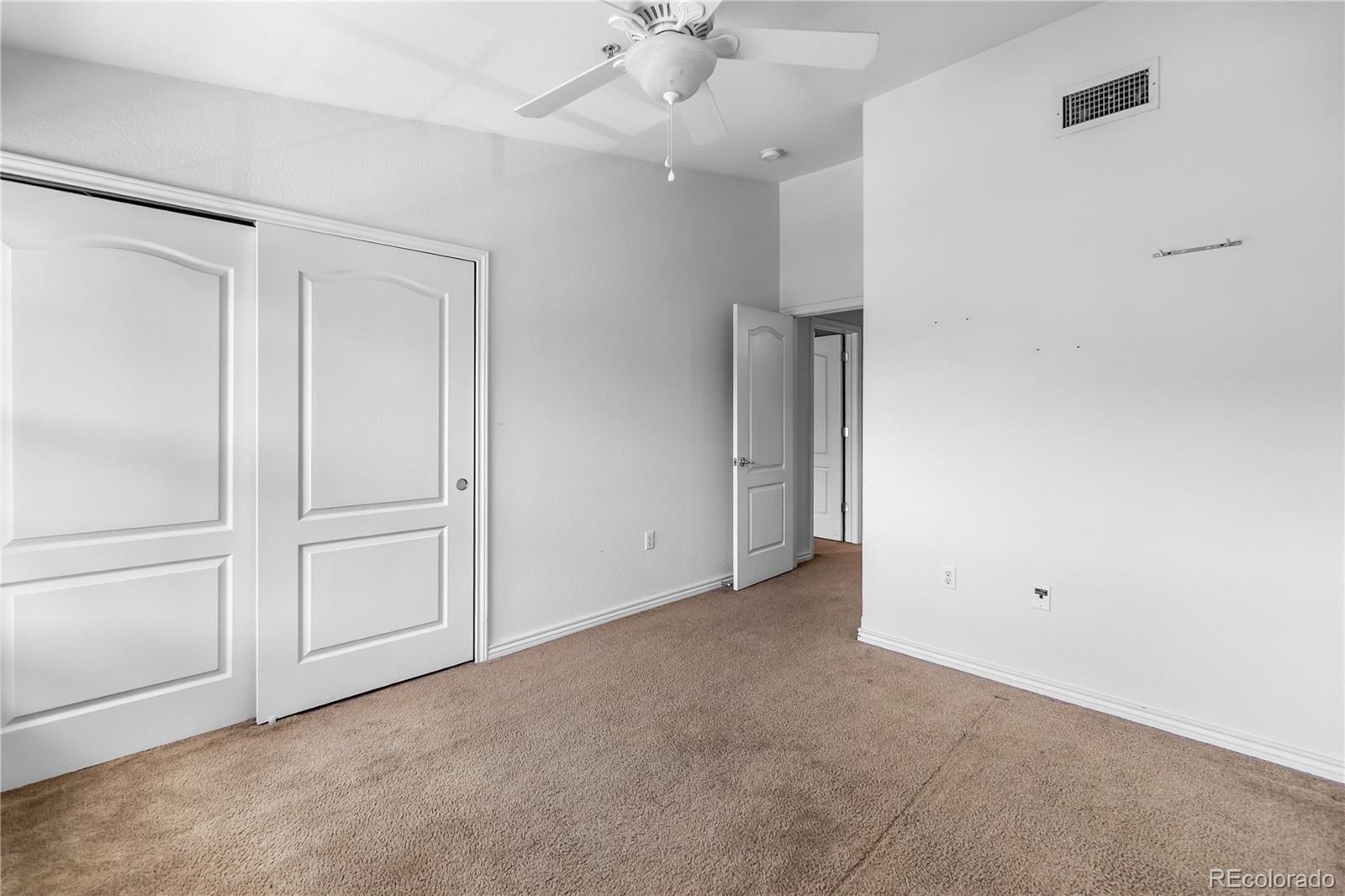 18669 Stroh Road, Unit 10204 Parker, CO 80134 - Photo 14 of 24 a view of an empty room