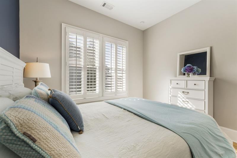 1105 Lee Street Milton, GA 30004 - Photo 22 of 47 a bedroom with a bed and window