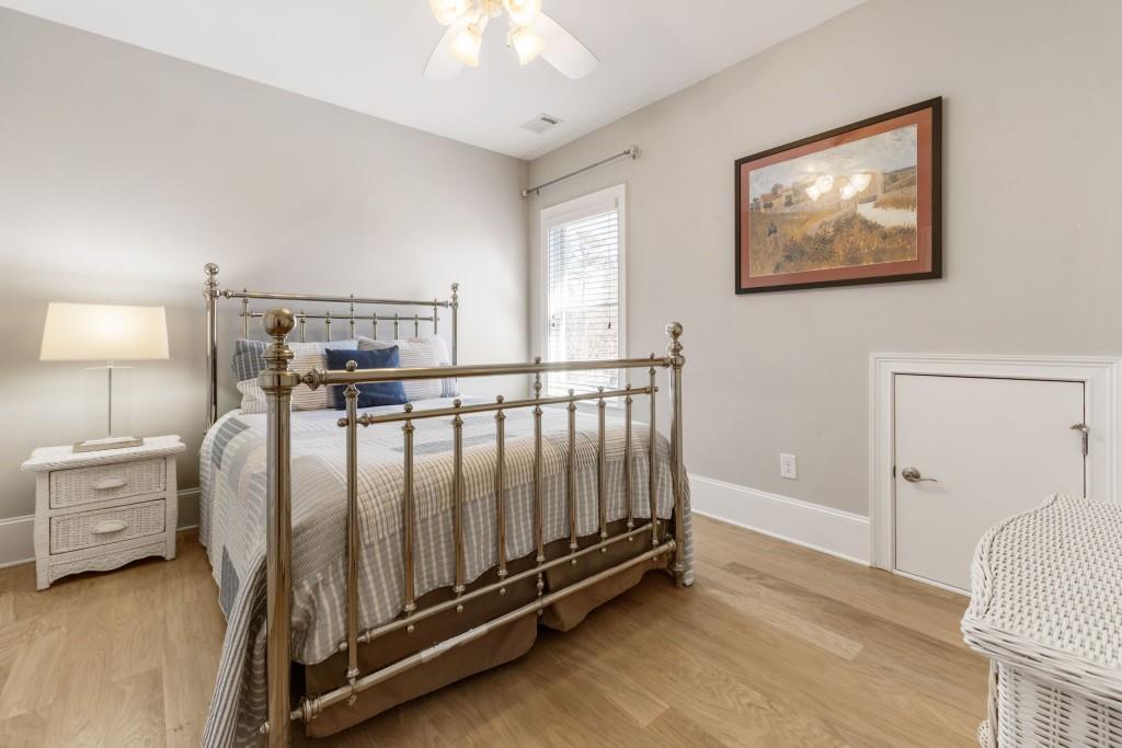 1105 Lee Street Milton, GA 30004 - Photo 32 of 47 a bed room with a bed and a night stand