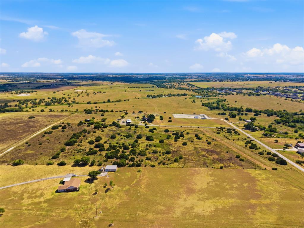 6940 Lonesome Road Godley, TX 76044 - Photo 9 of 14 Expansive rural property featuring open fields and scattered trees