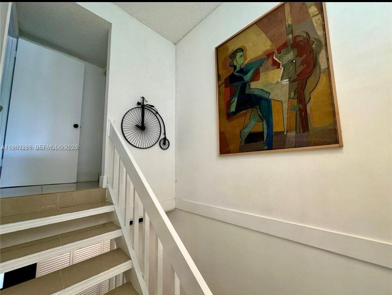 10640 Southwest 75th Lane Miami, FL 33173 - Photo 11 of 21 a bathroom with a sink and a mirror