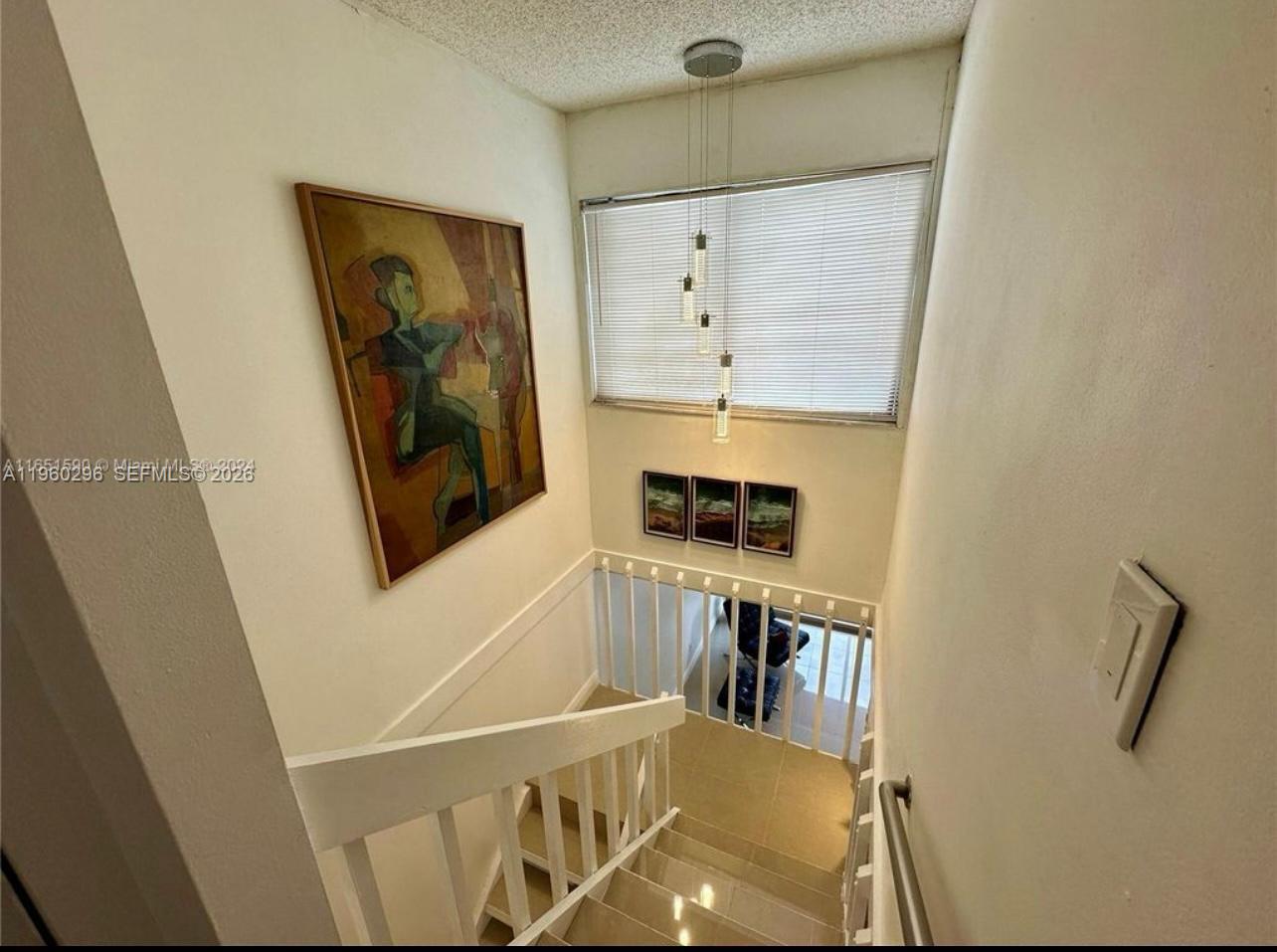 10640 Southwest 75th Lane Miami, FL 33173 - Photo 12 of 21 a view of a hallway with the elevator