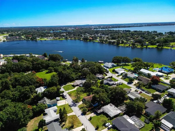 an aerial view of a houses with outdoor space