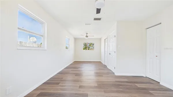 a bathroom with a toilet sink and shower