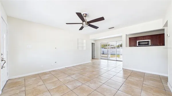 a view of an empty room and window