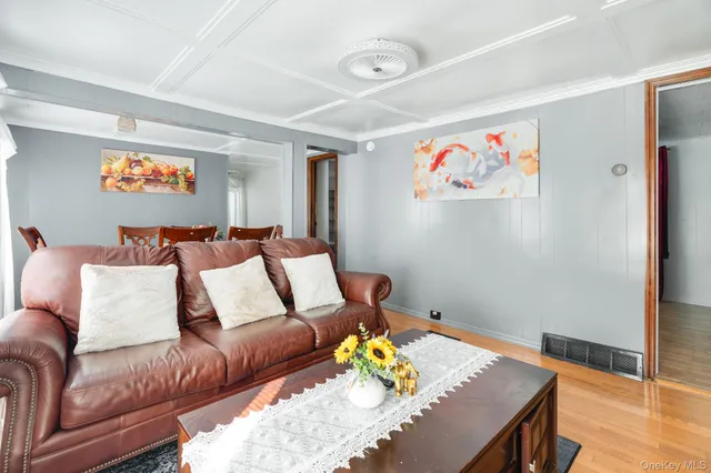 a workspace with furniture and wooden floor