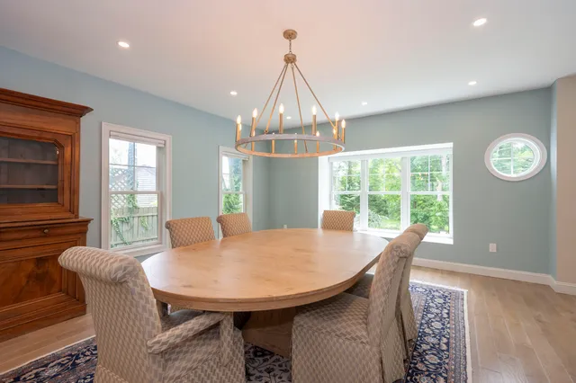 a view of a dining room with furniture window and outside view