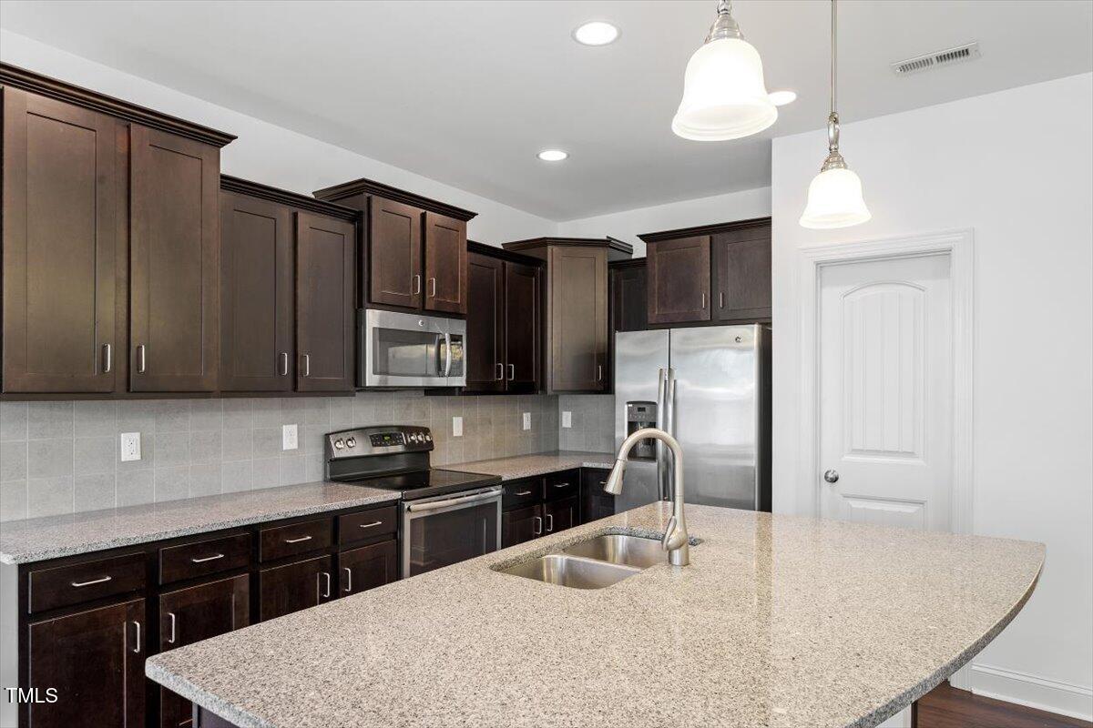 140 Token House Road Durham, NC 27703 - Photo 14 of 31 Kitchen Lots of Cabinet Space