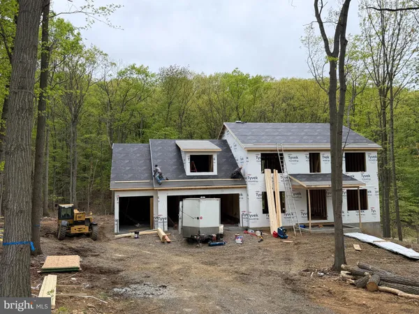 front view of house with a yard
