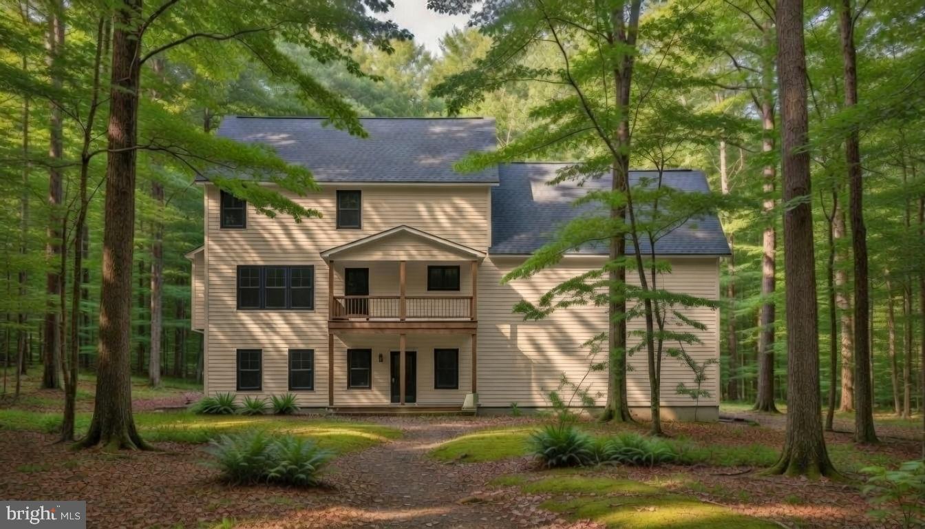 1163 Kuhn Road Boiling Springs, PA 17007 - Photo 2 of 2 a front view of a house with a garden