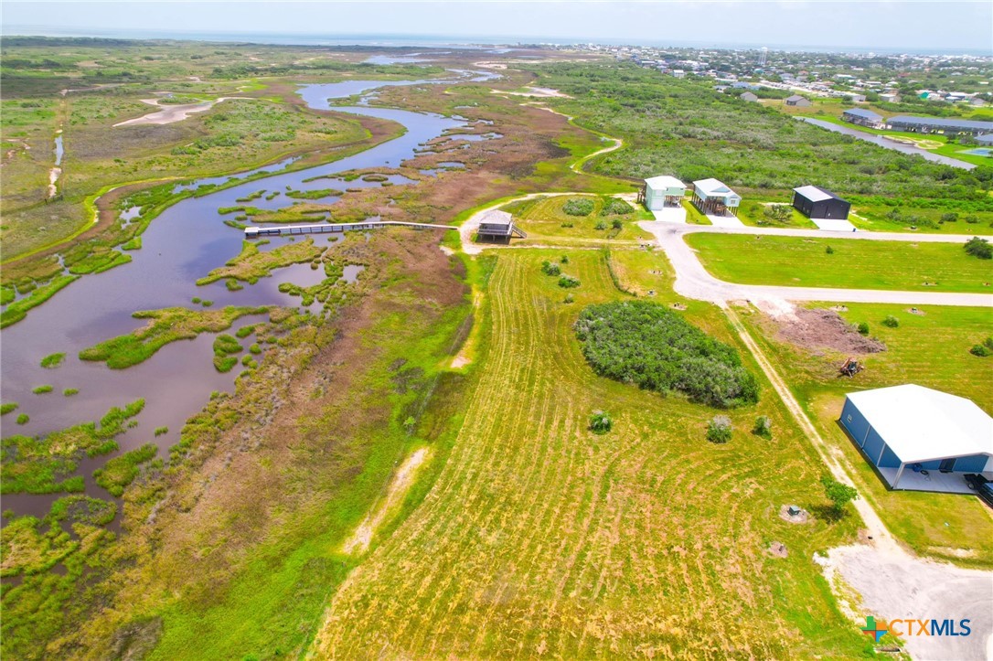 9 Boca Grande Loop Port O'Connor, TX 77982 - Photo 12 of 44 a view of an swimming pool and an outdoor space