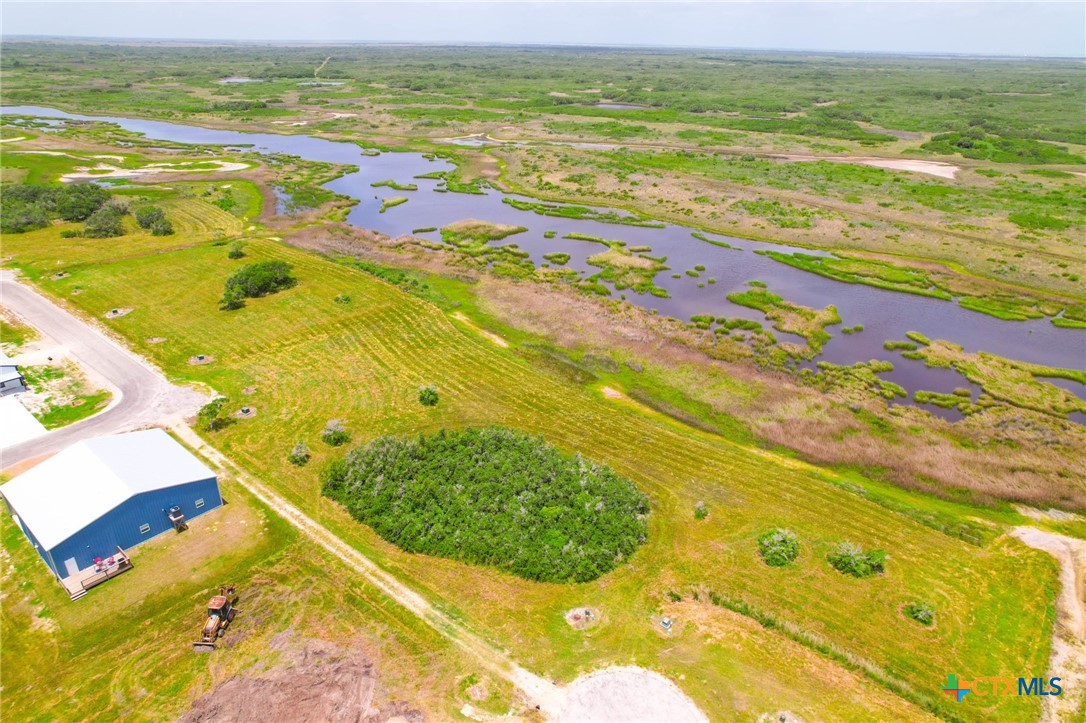 9 Boca Grande Loop Port O'Connor, TX 77982 - Photo 17 of 44 a view of an ocean and a beach