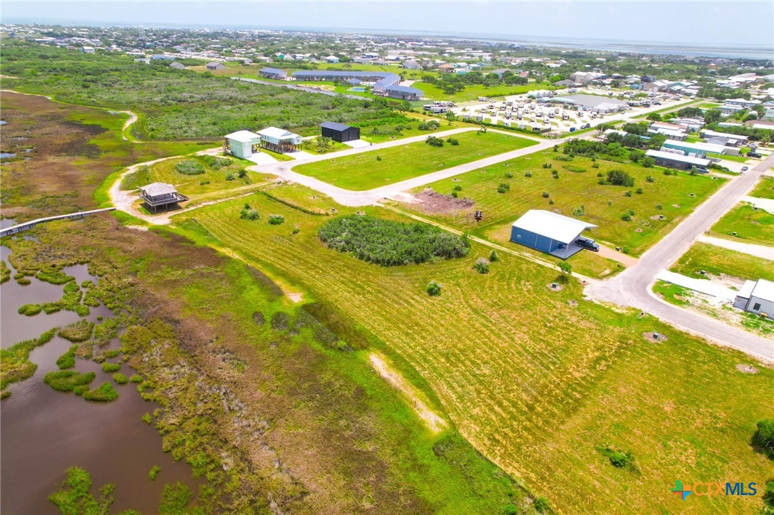 9 Boca Grande Loop Port O'Connor, TX 77982 - Photo 18 of 44 a view of a swimming pool and an outdoor space