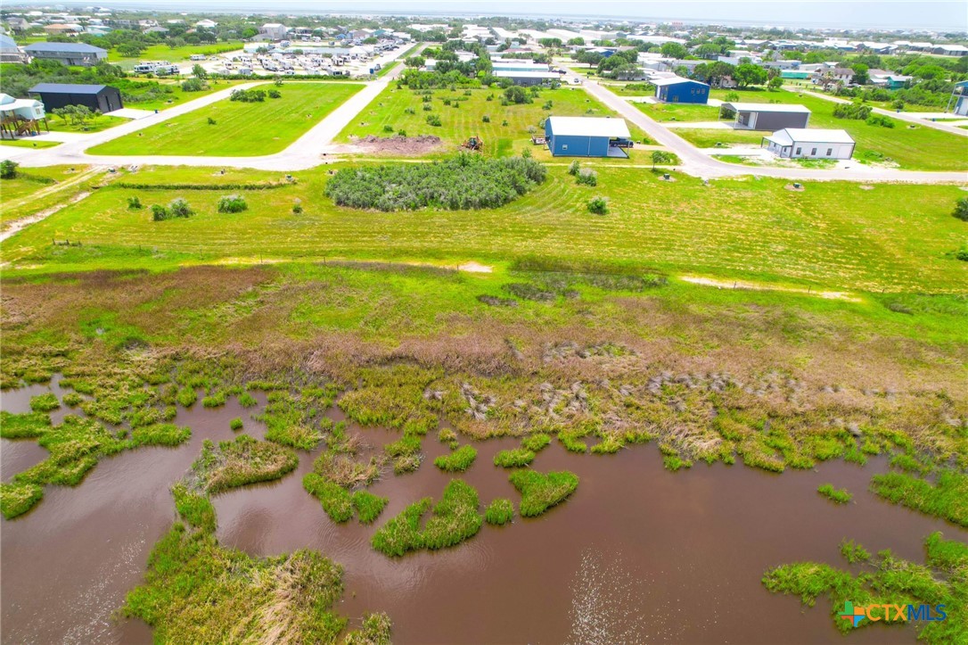 9 Boca Grande Loop Port O'Connor, TX 77982 - Photo 24 of 44 a view of a swimming pool with an ocean view