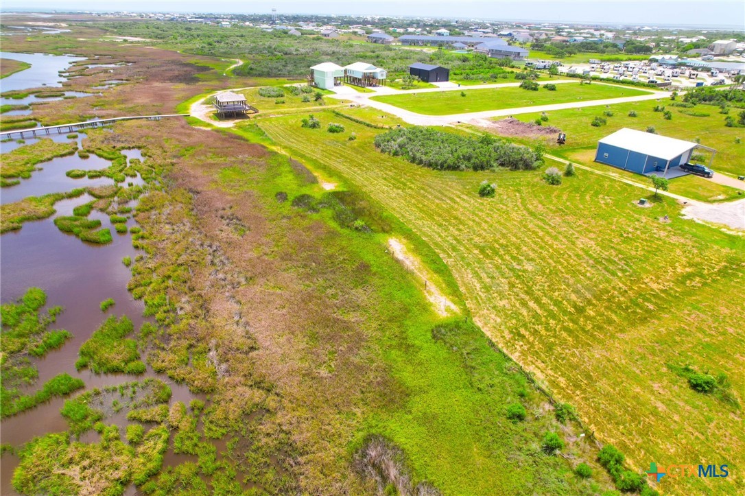 9 Boca Grande Loop Port O'Connor, TX 77982 - Photo 26 of 44 a view of a lake with a houses
