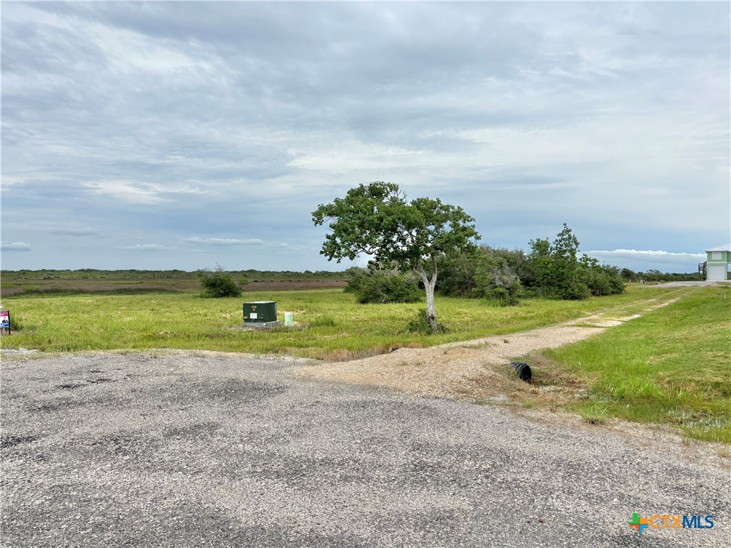 9 Boca Grande Loop Port O'Connor, TX 77982 - Photo 32 of 44 a view of a lake with a house