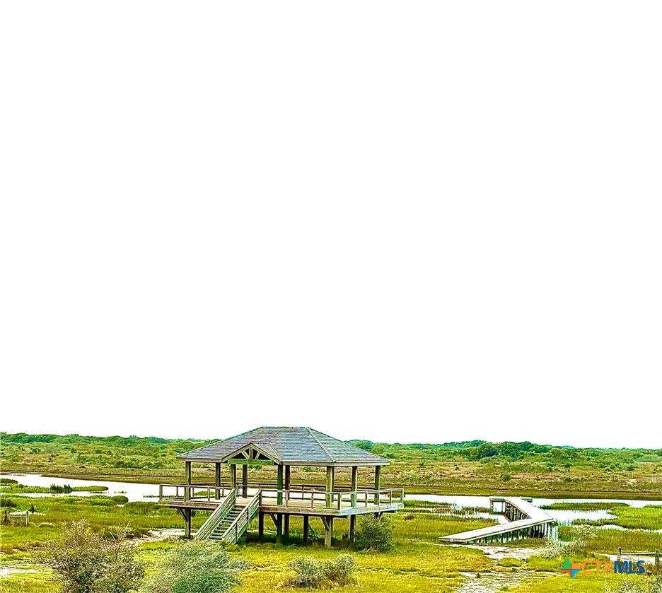 9 Boca Grande Loop Port O'Connor, TX 77982 - Photo 44 of 44 a view of a large body of water with a large mountain