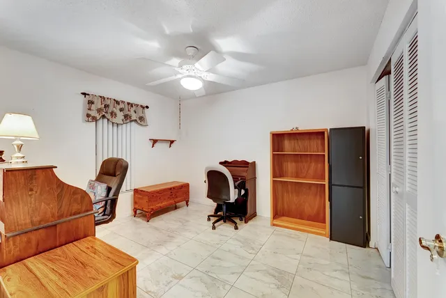 a room with furniture and gym equipment