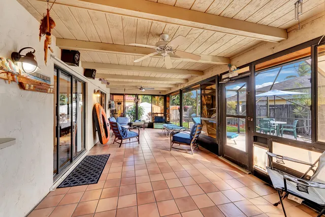 a outdoor space with lots of tables and chairs