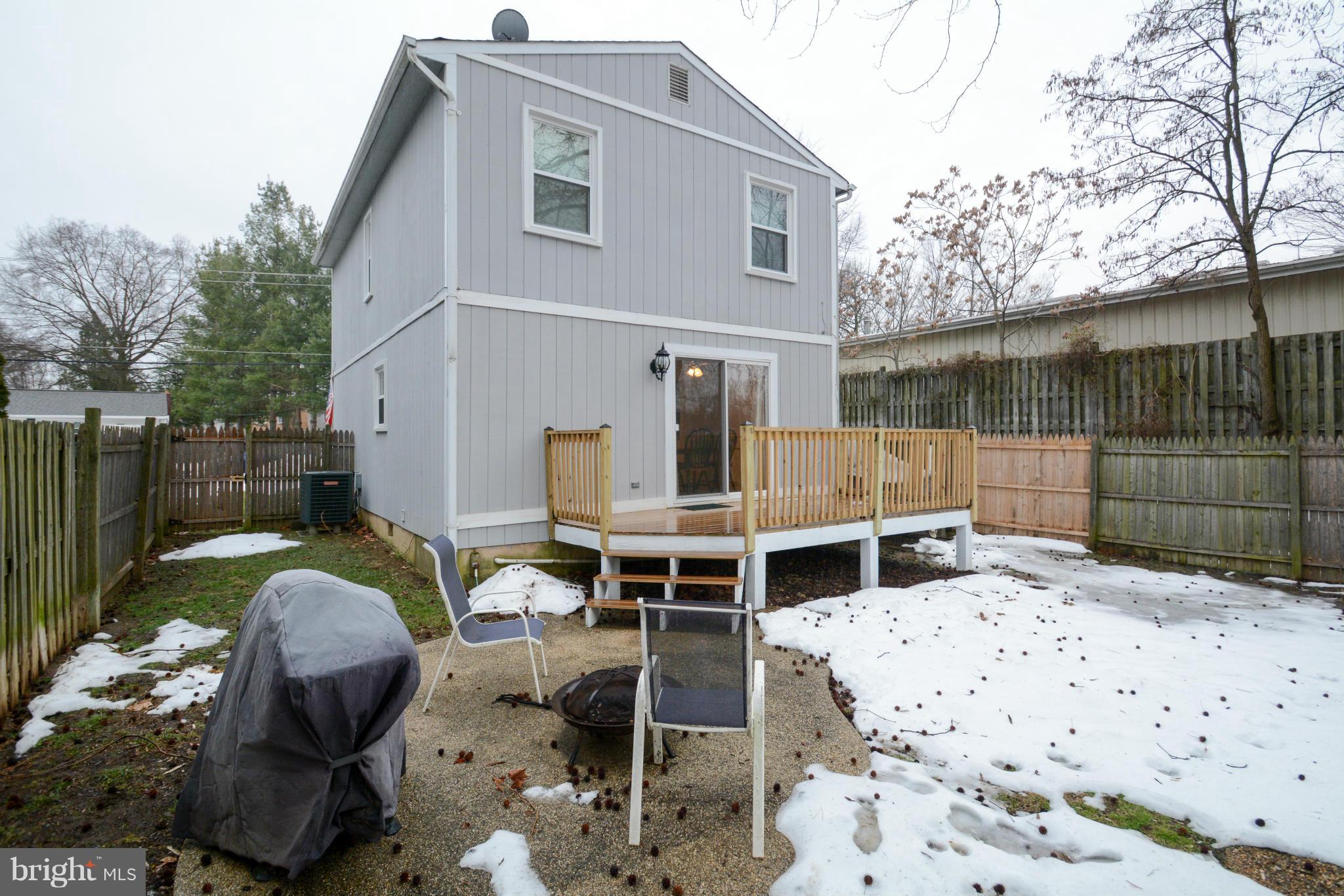 110 Oakwood Road Edgewater, MD 21037 - Photo 23 of 23 a backyard of a house with table and chairs